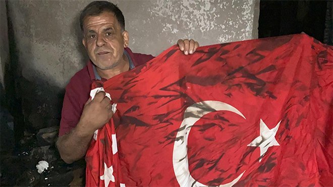 Ev yandı, Türk bayrağı yanmadı