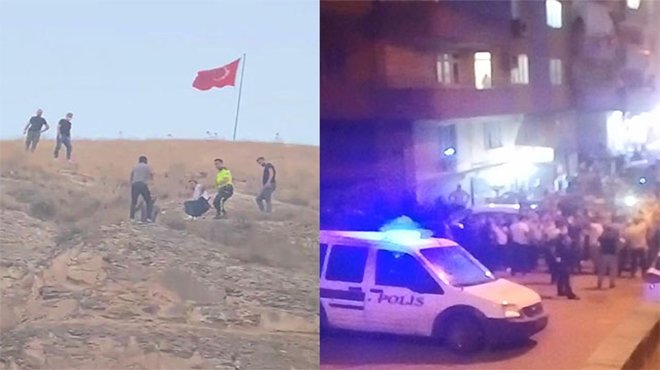 Türk bayrağını indirmeye kalkışan kişiyi, linçten polis kurtardı